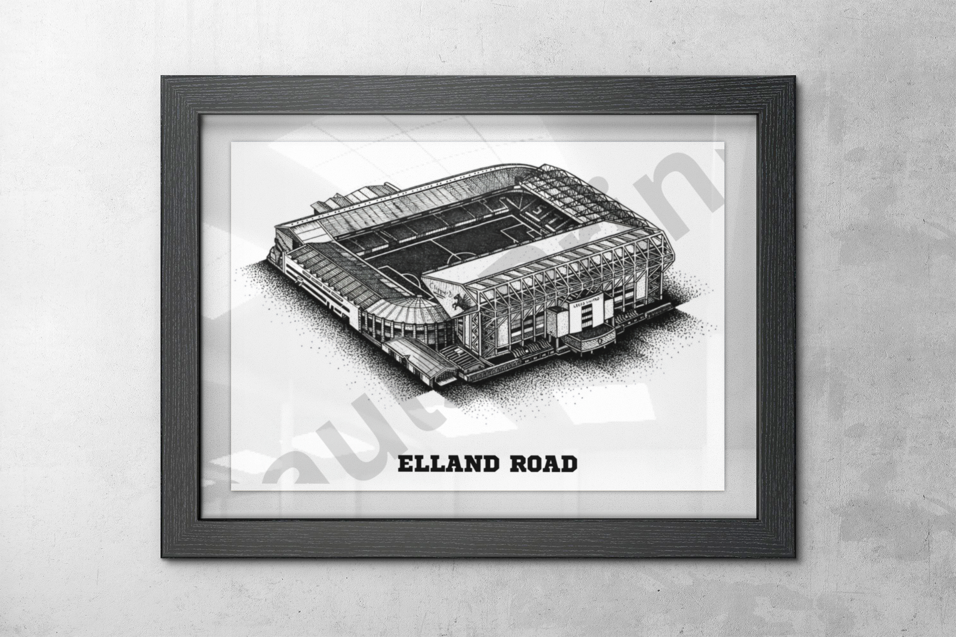 Elland Road stadium drawing framed in black and hung on a modern concrete wall, perfect for football fans or home office decor