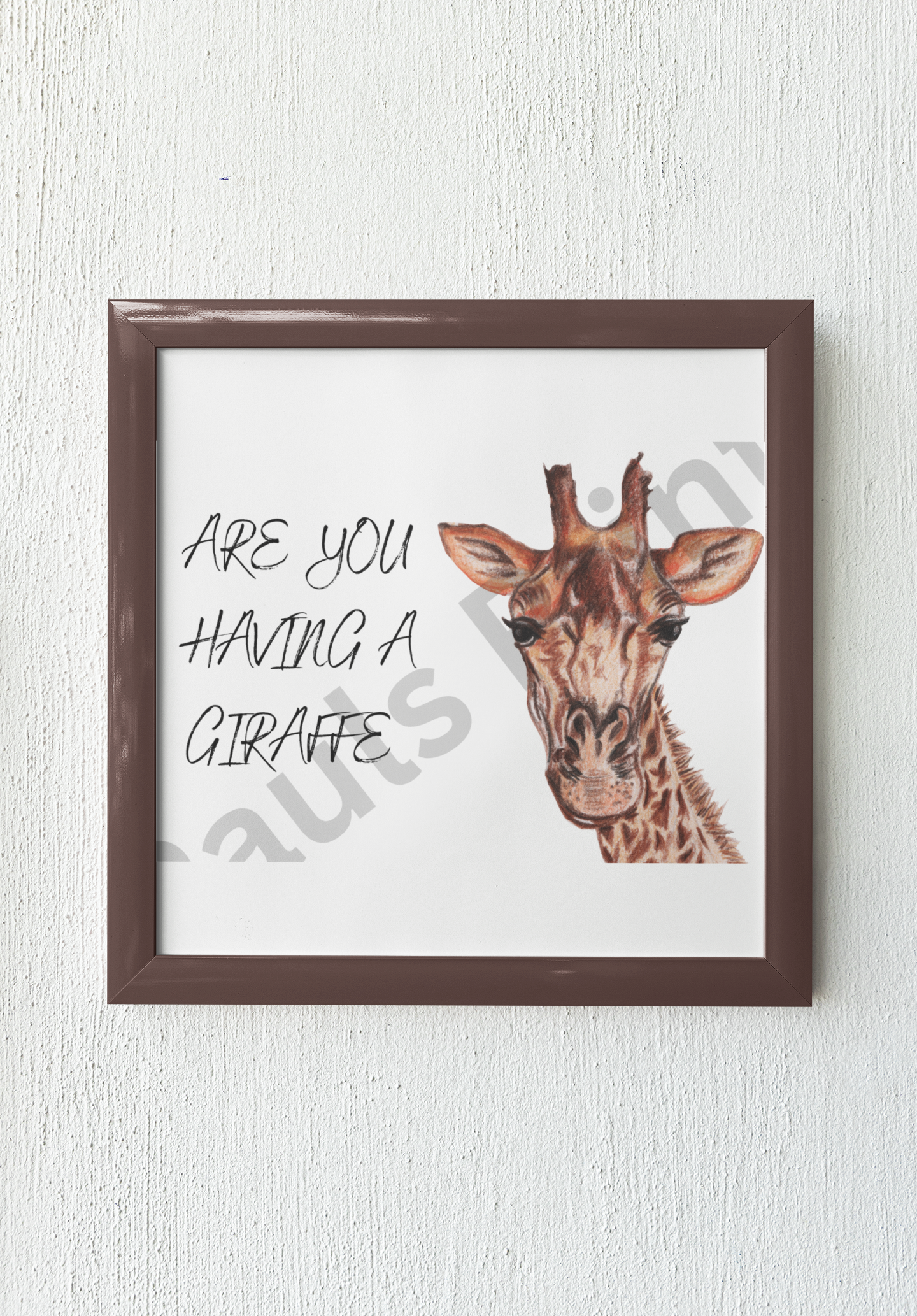 Brown-framed giraffe illustration with playful quote hanging on a white textured wall.