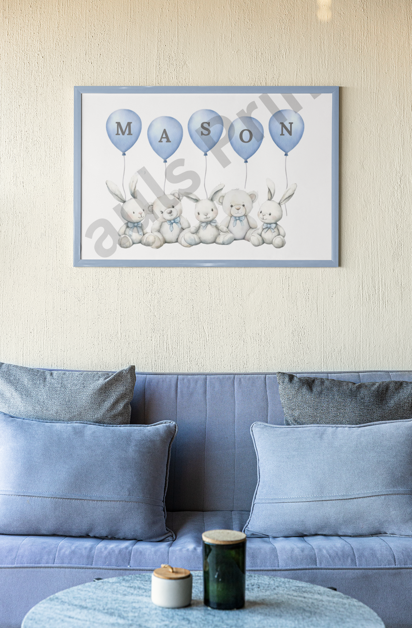 Children’s personalised name print featuring animals with MASON in blue balloons, framed above a soft blue couch in a stylish room