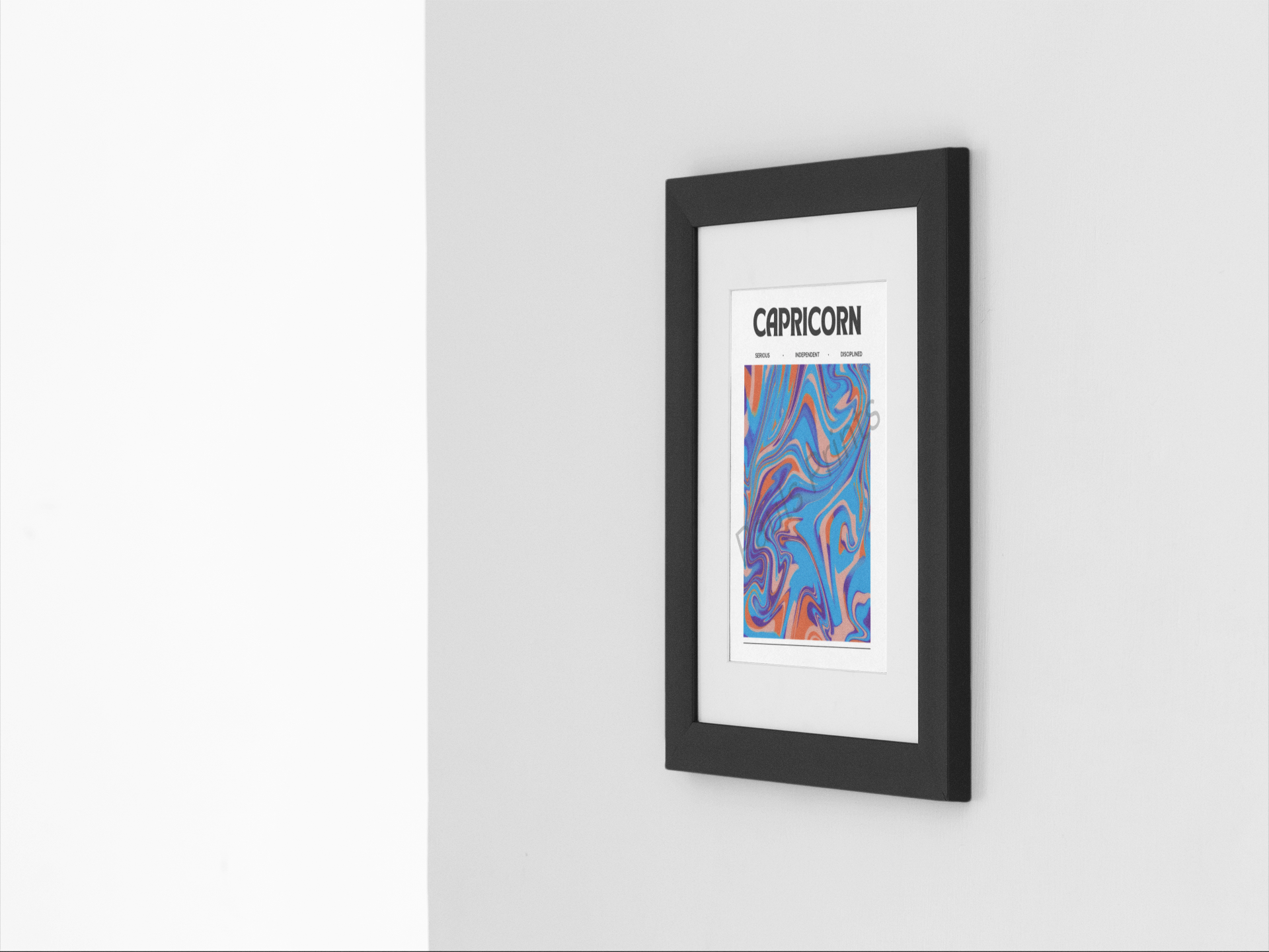 Capricorn zodiac poster featuring abstract blue and orange marbling, hung in a slim black frame on a clean white and grey background.