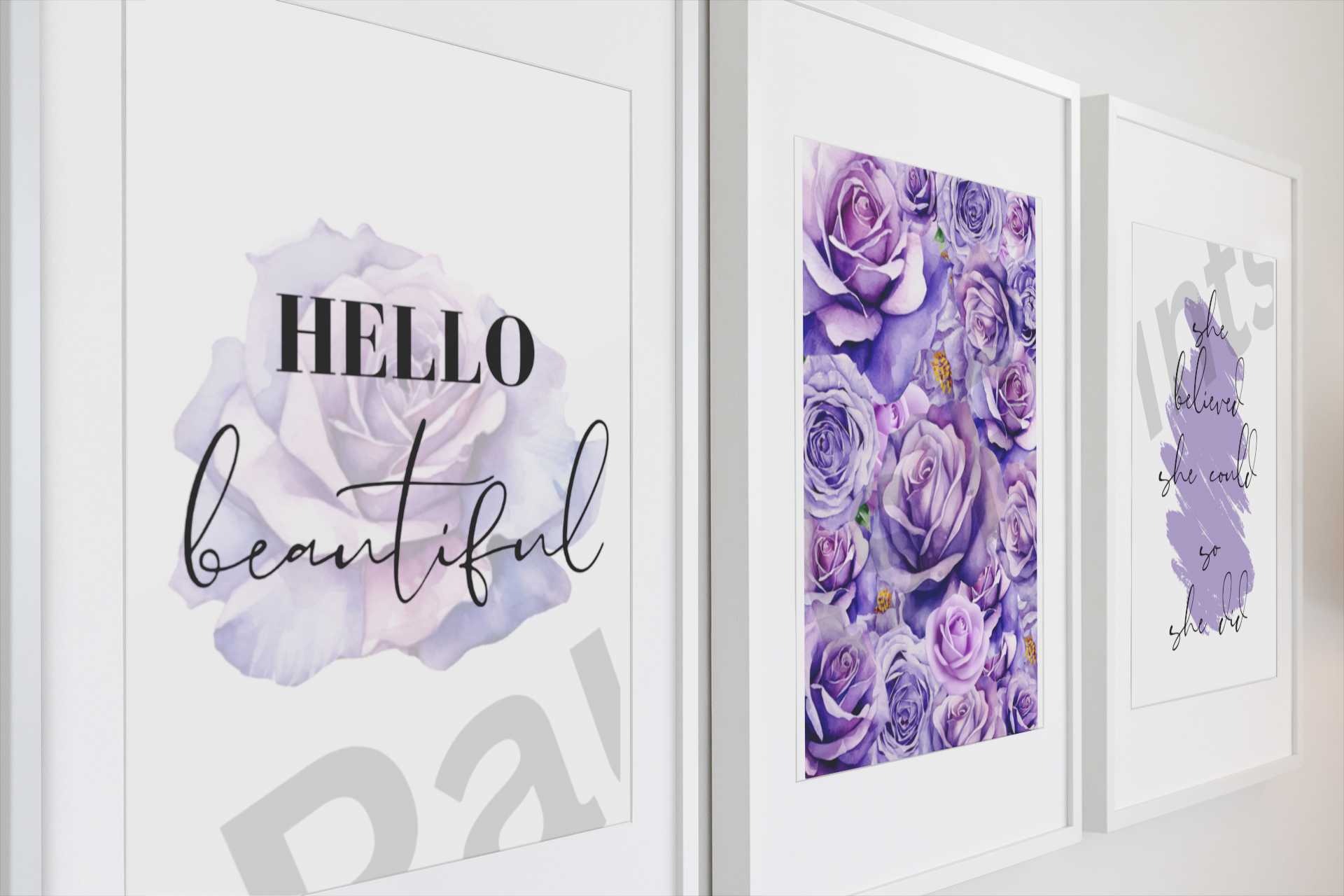 Angled close-up of three lavender and purple wall prints, including watercolor roses and stylish modern typography.