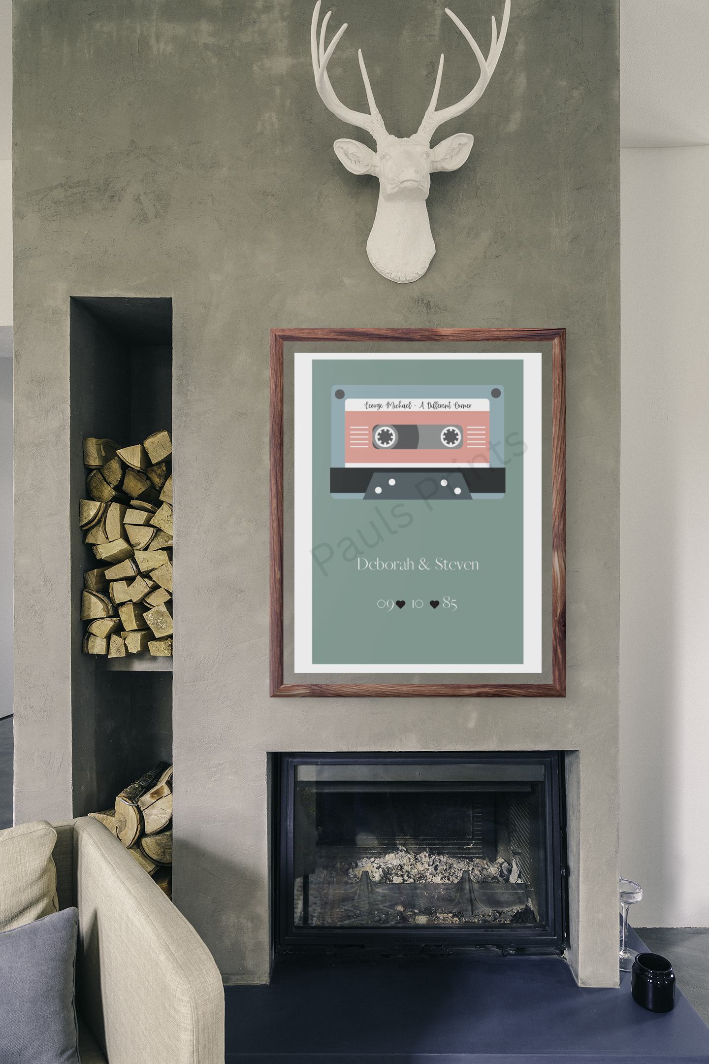 Large framed cassette print above a fireplace in a rustic living room with stacked logs and concrete wall texture.