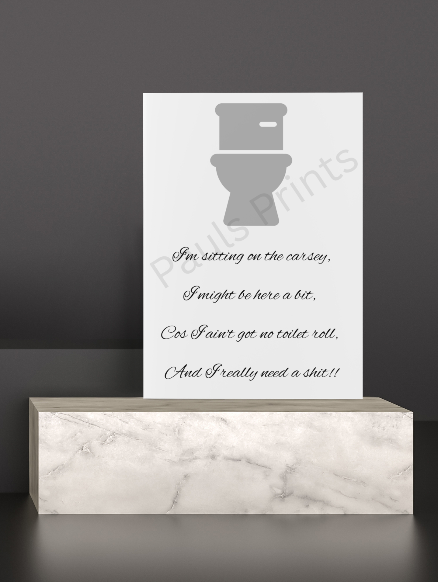 Humorous toilet-themed wall art with a grey toilet icon and playful rhyme, displayed on a marble stand against a grey wall.