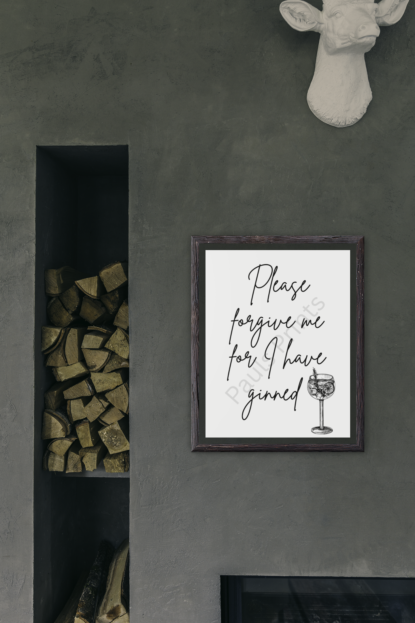 Framed gin quote wall art on dark textured wall above stacked firewood.