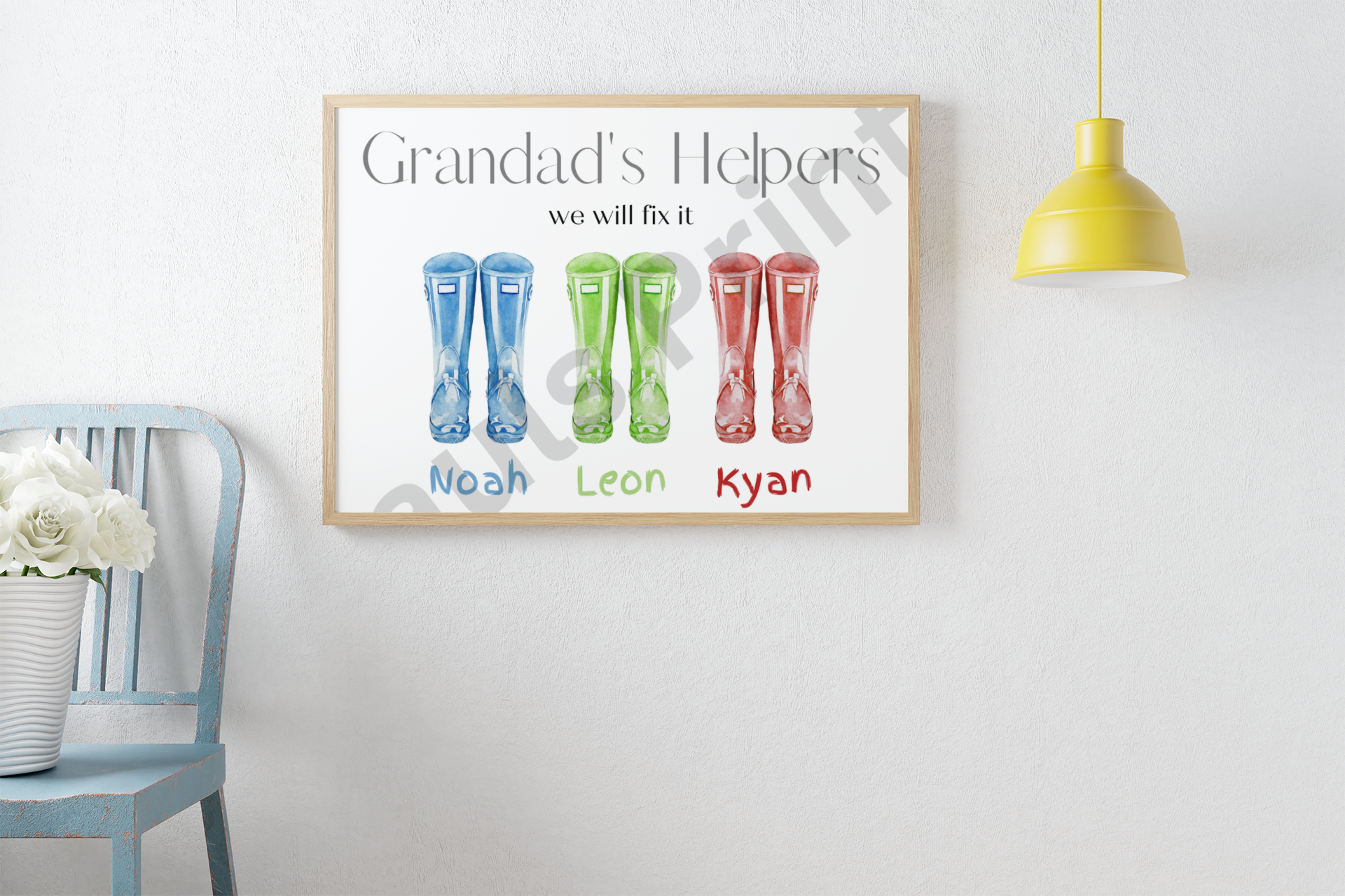 Wooden framed “Grandad’s Helpers” wall art with boots and names, styled with a rustic blue chair and yellow ceiling lamp in a bright white hallway