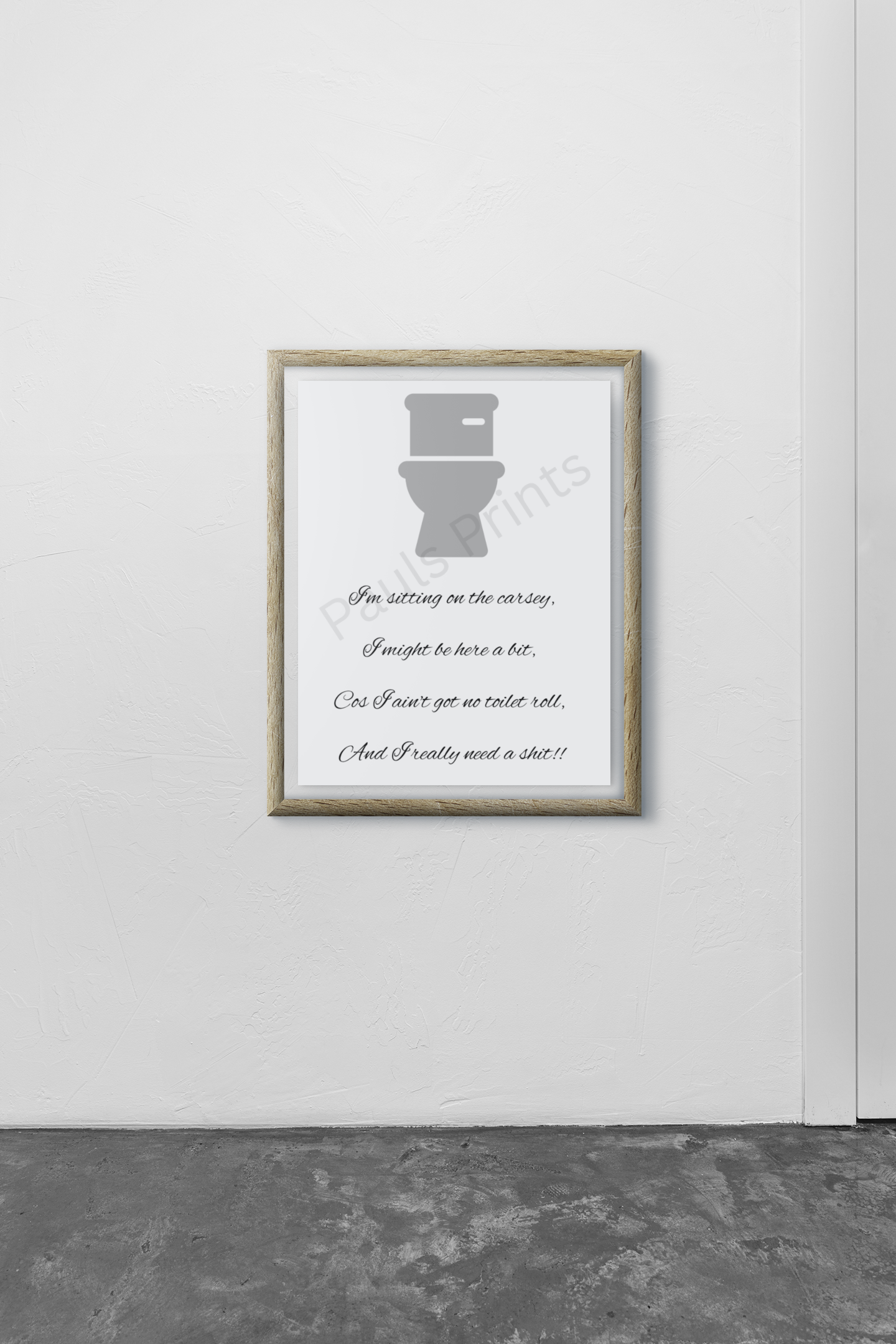 Minimalist framed print featuring a humorous toilet poem with a grey toilet graphic, displayed on a white textured wall.