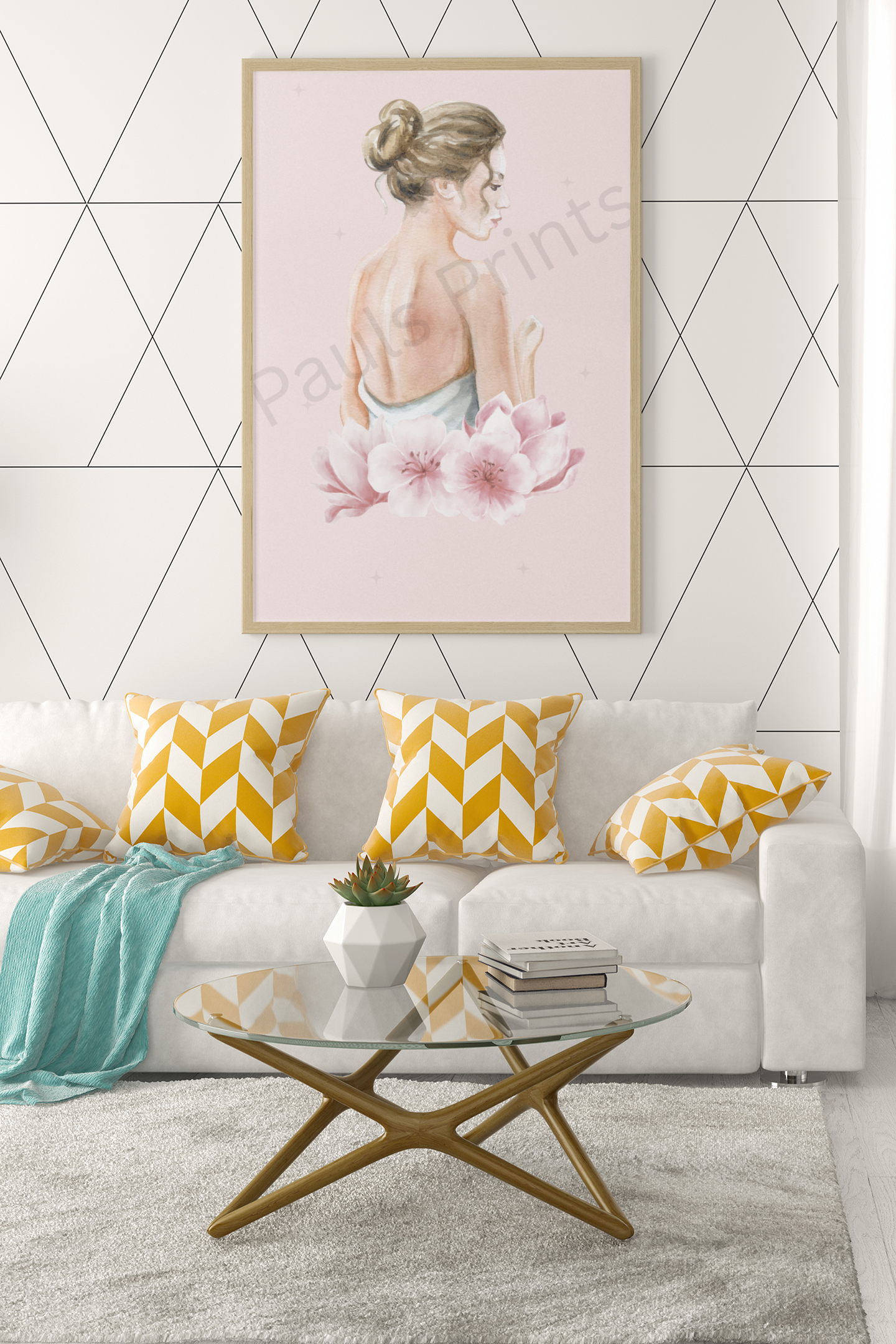 Large framed watercolour art print of a woman with her back turned, surrounded by pink flowers, displayed above a white sofa with yellow chevron cushions.
